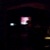 Table lamps, on park tables, it looks like a house, and John Bonnell is singing to the house guests (the over 200 of them)